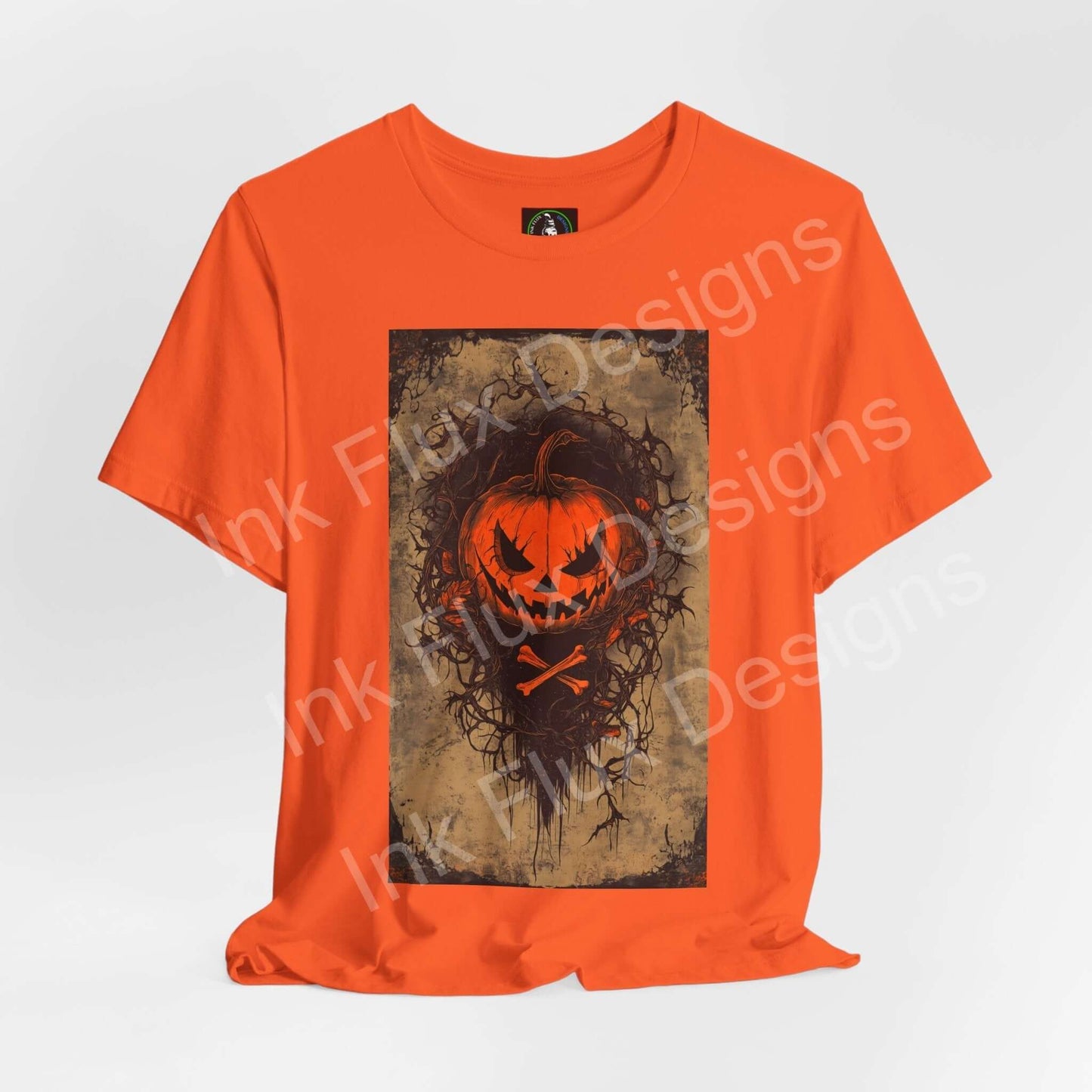 jack-o-lantern t-shirt featuring a bold pumpkin design on an orange shirt, perfect for Halloween celebrations.