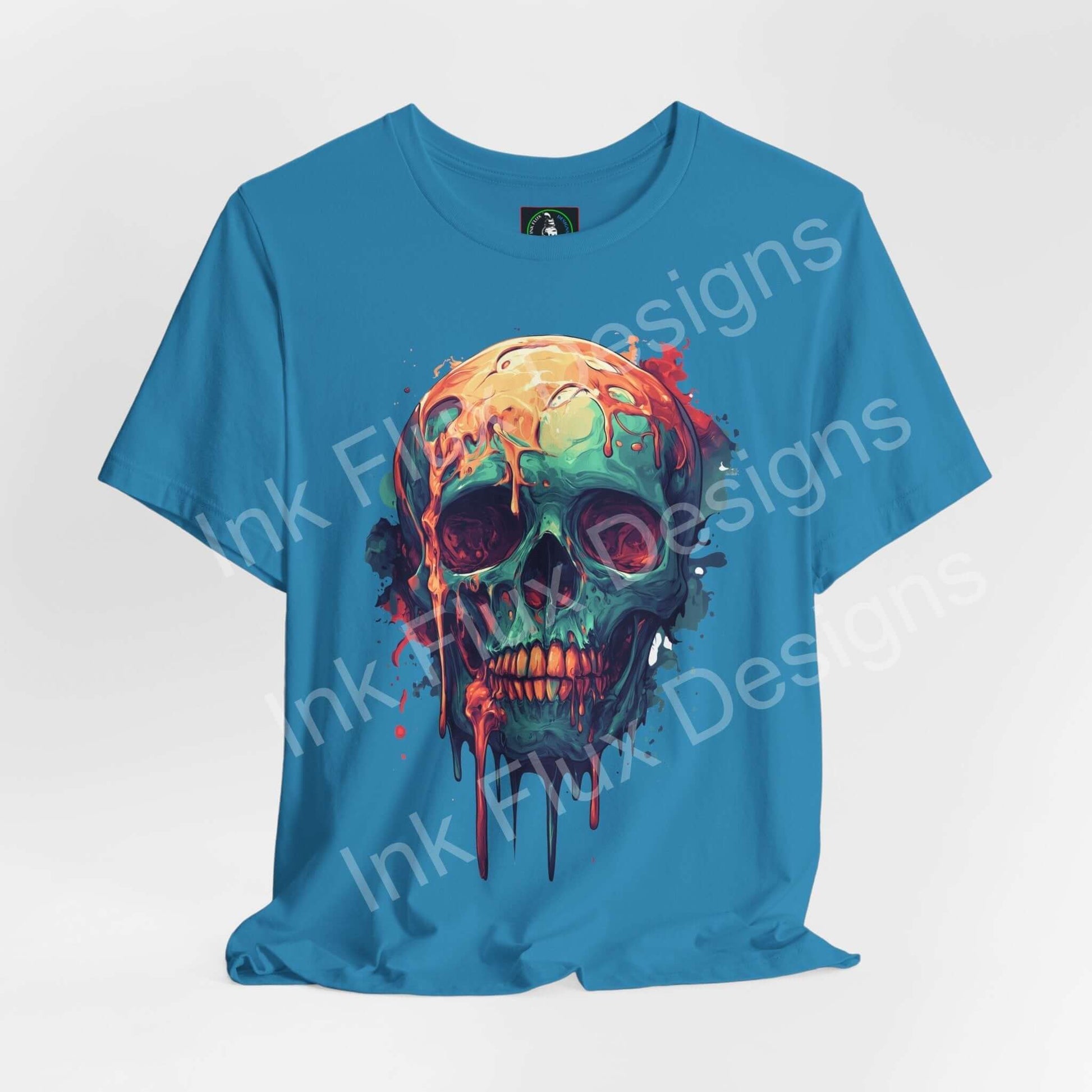 Melted skull t-shirt featuring abstract drip art design by Ink Flux Designs on a blue unisex tee.