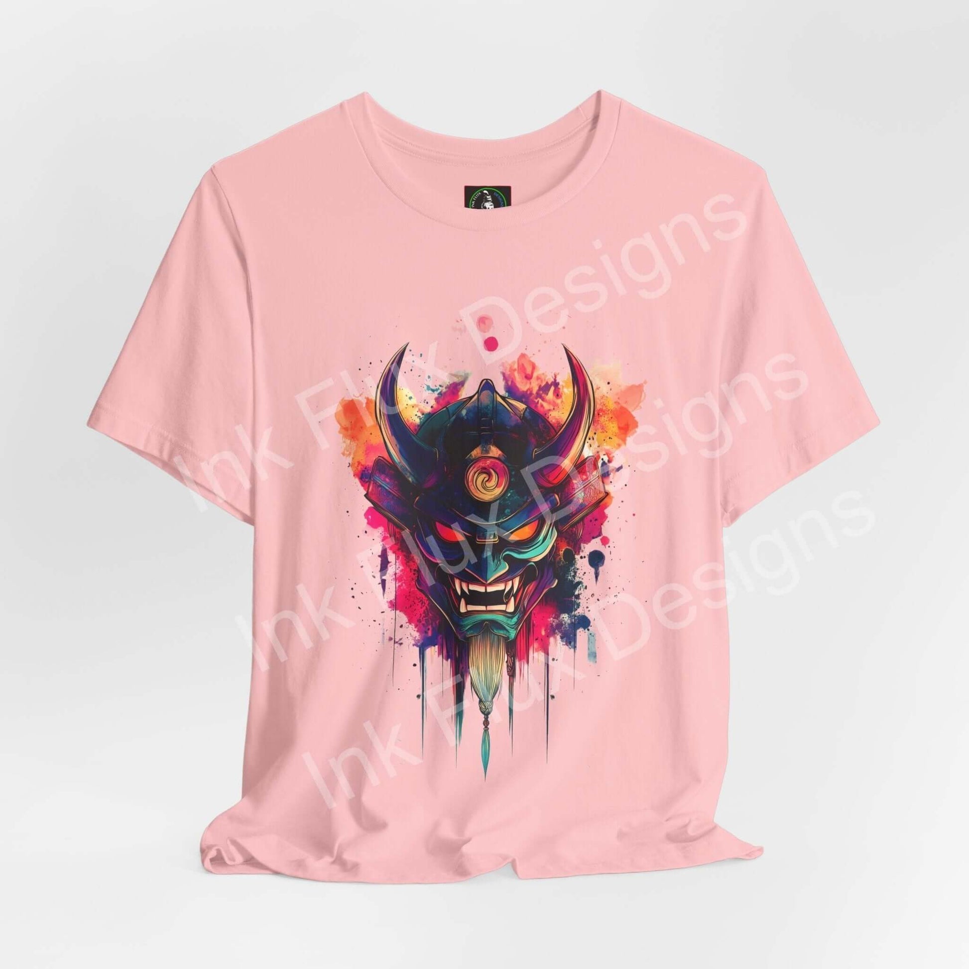 Oni Mask T-Shirt featuring a vibrant Japanese demon design in bold colors on a pink background.