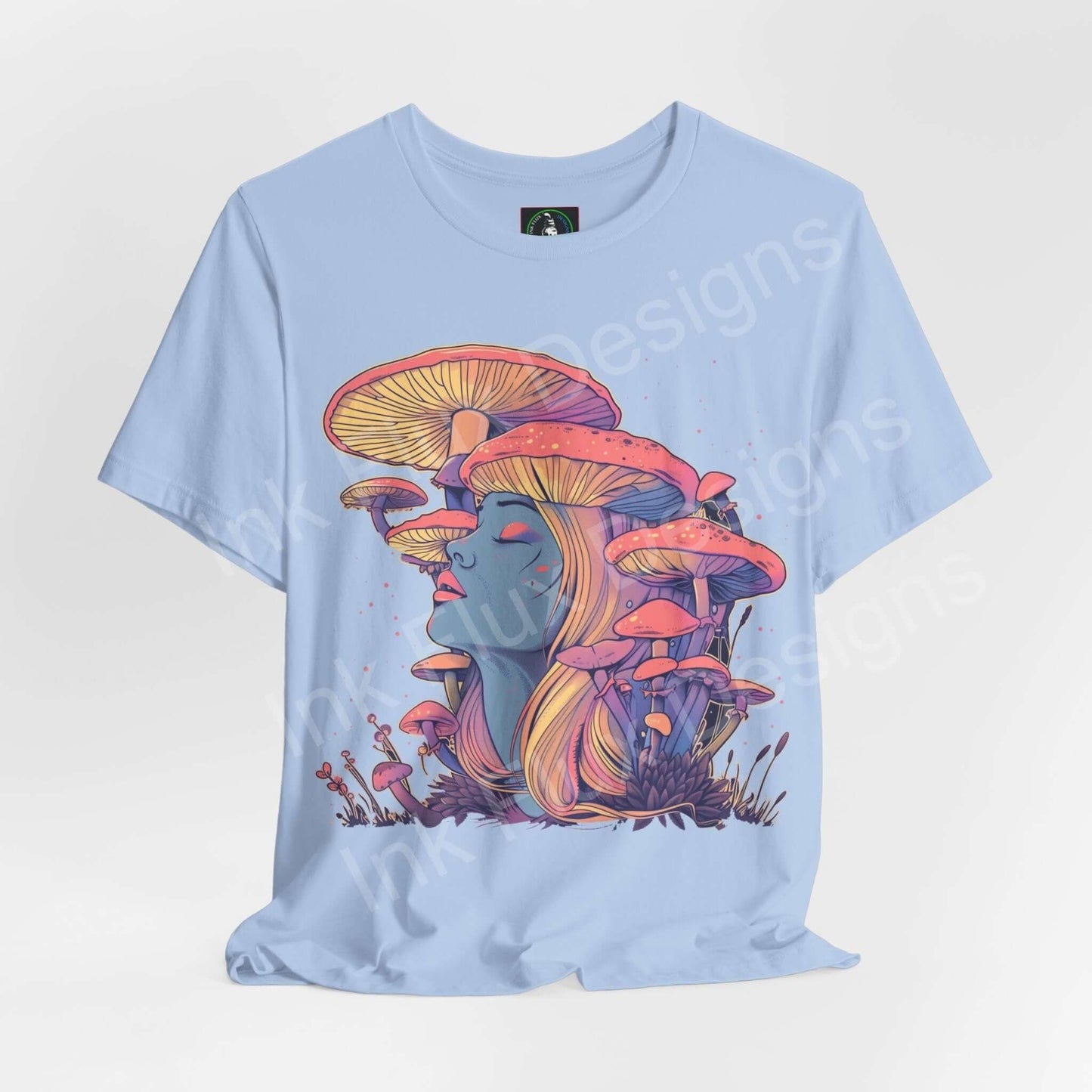 Light blue unisex T-shirt featuring a bold, trippy graphic of a face and psychedelic mushrooms in vibrant colors, perfect for fans of unique graphic tees.