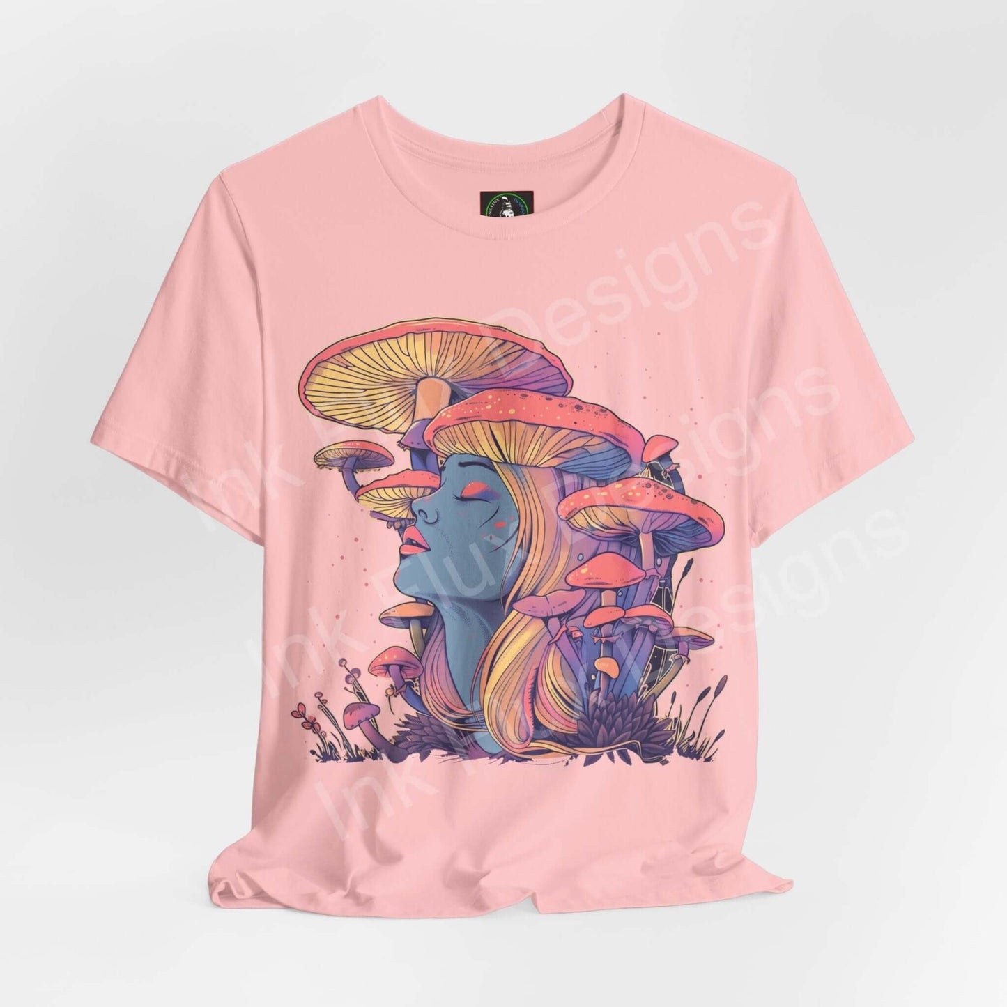 Pink unisex T-shirt with bold psychedelic mushroom graphic, featuring vibrant trippy design and made from breathable cotton.