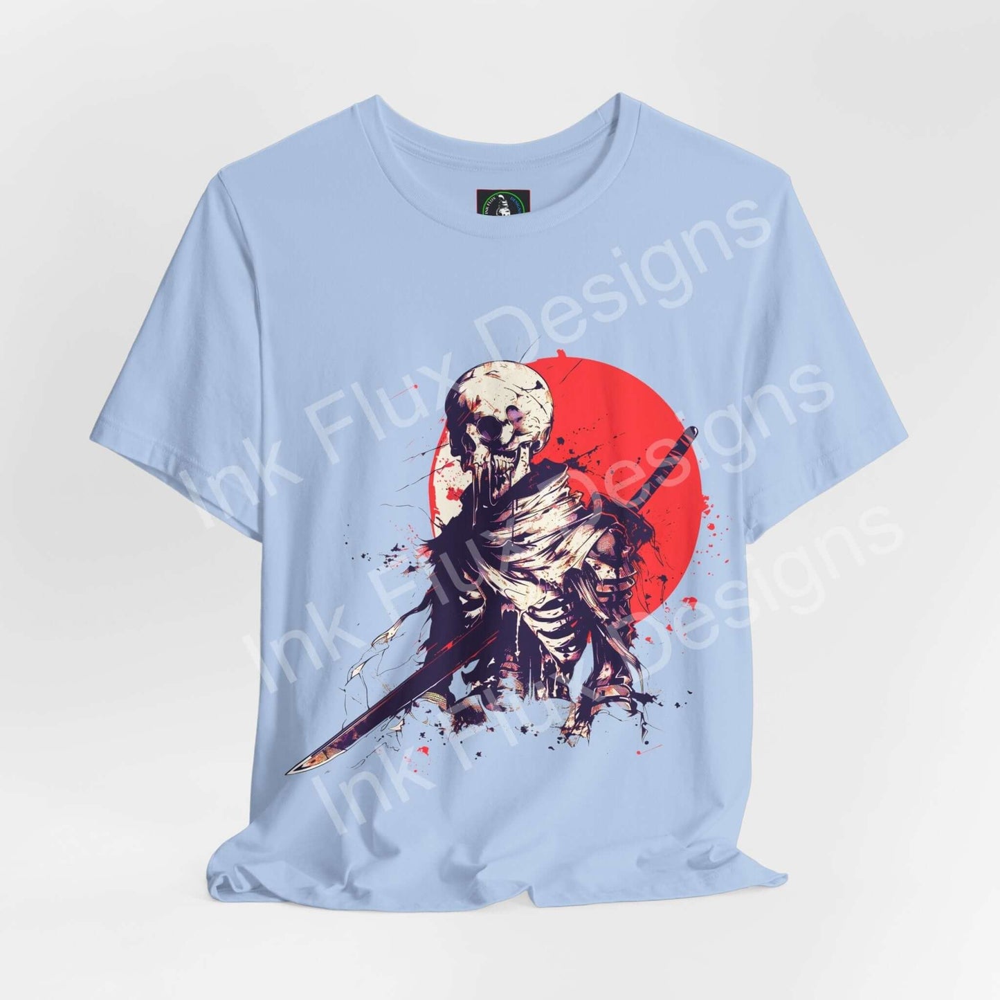 Shattered Warrior T-shirt by Ink Flux Designs, featuring a striking skeleton graphic on a light blue background.