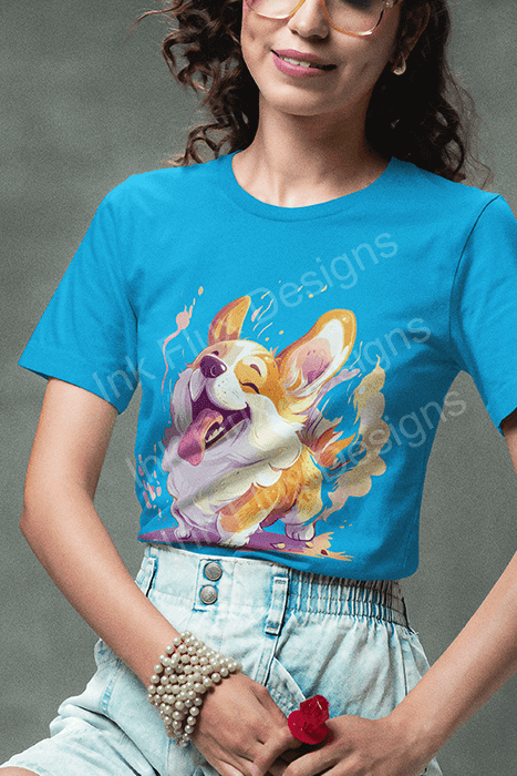 Woman in glasses wearing a blue T-shirt featuring a vibrant, playful dog design from the "Dogs Rule!" collection