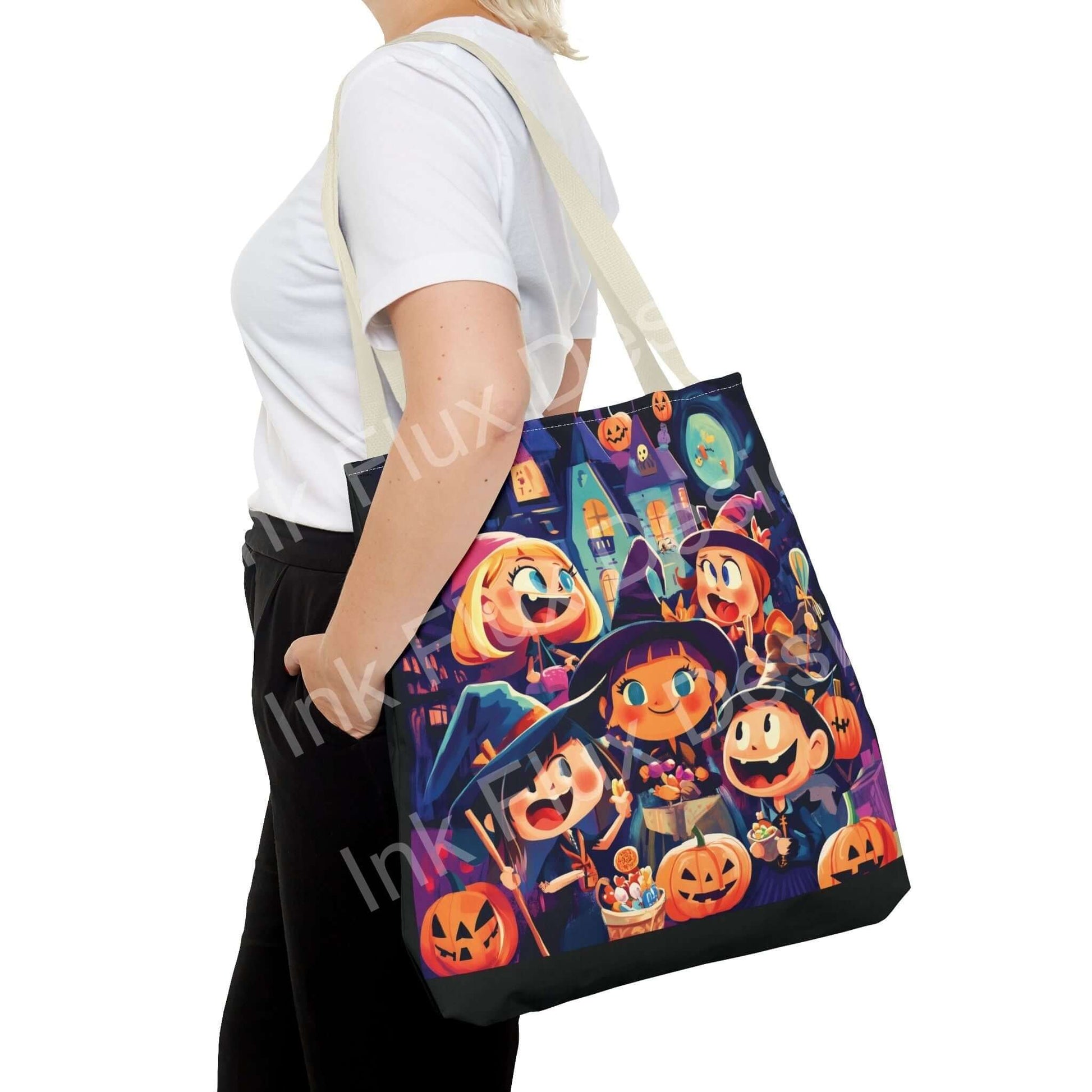 Woman carrying a Little Witches all-over print tote bag featuring Halloween-themed characters, available in multiple sizes and handle colors.