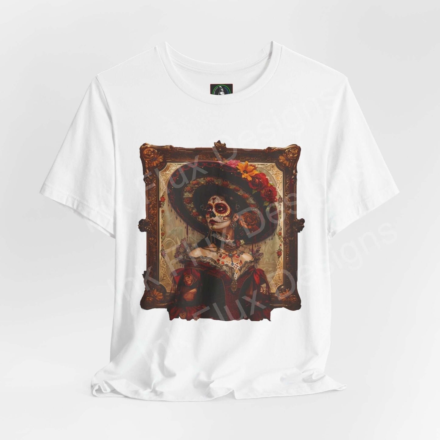 Day of the Dead themed graphic tee featuring a Día de Muertos skeleton portrait in an ornate frame, on a unisex white T-shirt.