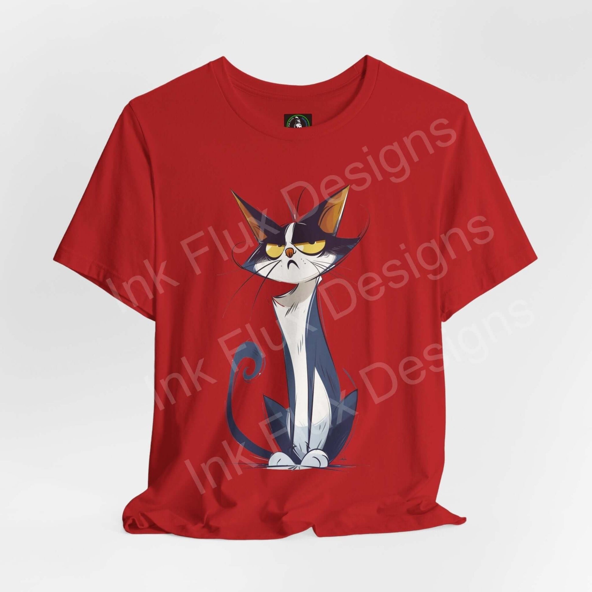 Red unisex T-shirt featuring a graphic of a mischievous cat, ideal for cat lovers and fans of graphic tees.