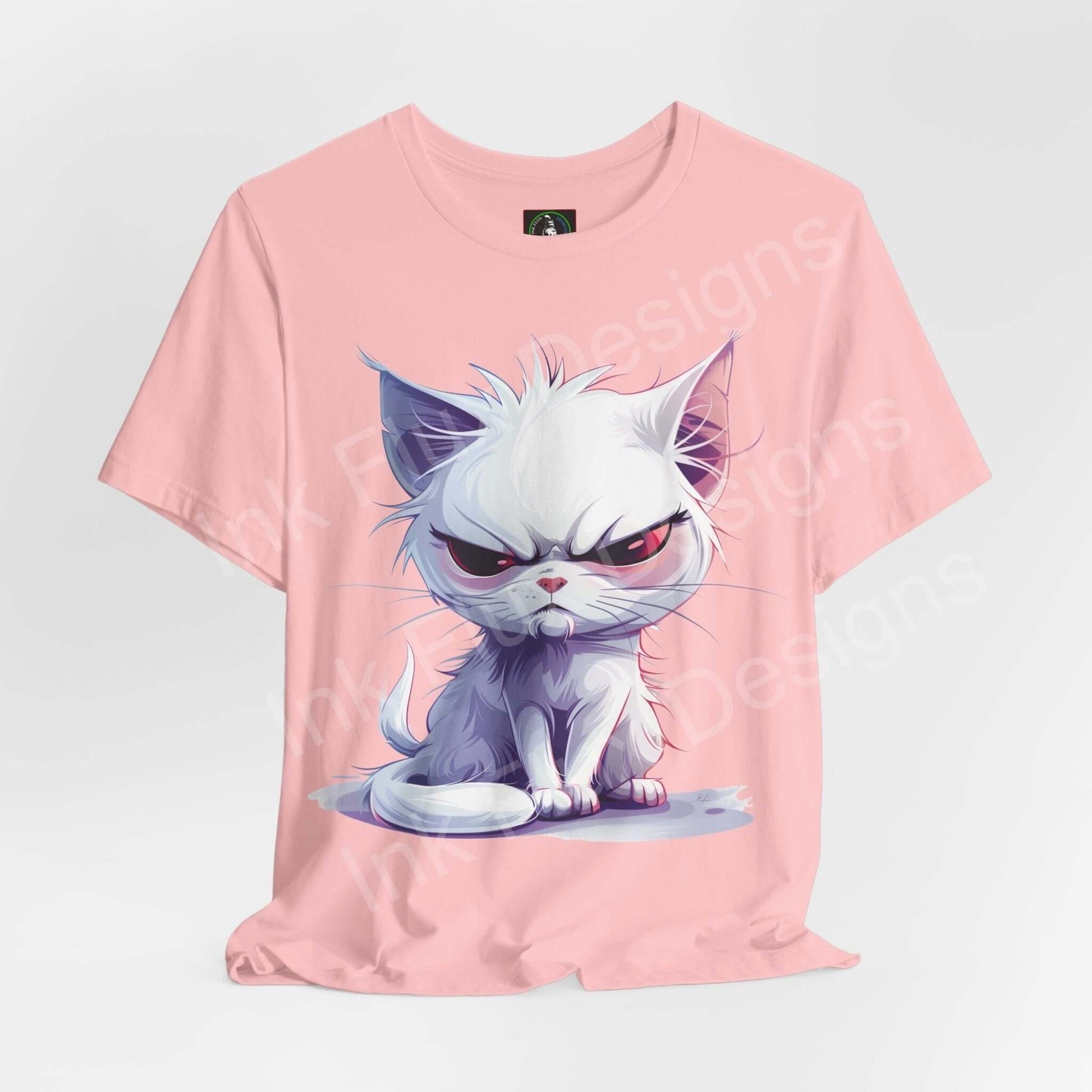 Pink unisex T-shirt featuring a graphic of a grumpy white cat, ideal for cat lovers and fans of comfy graphic tees.