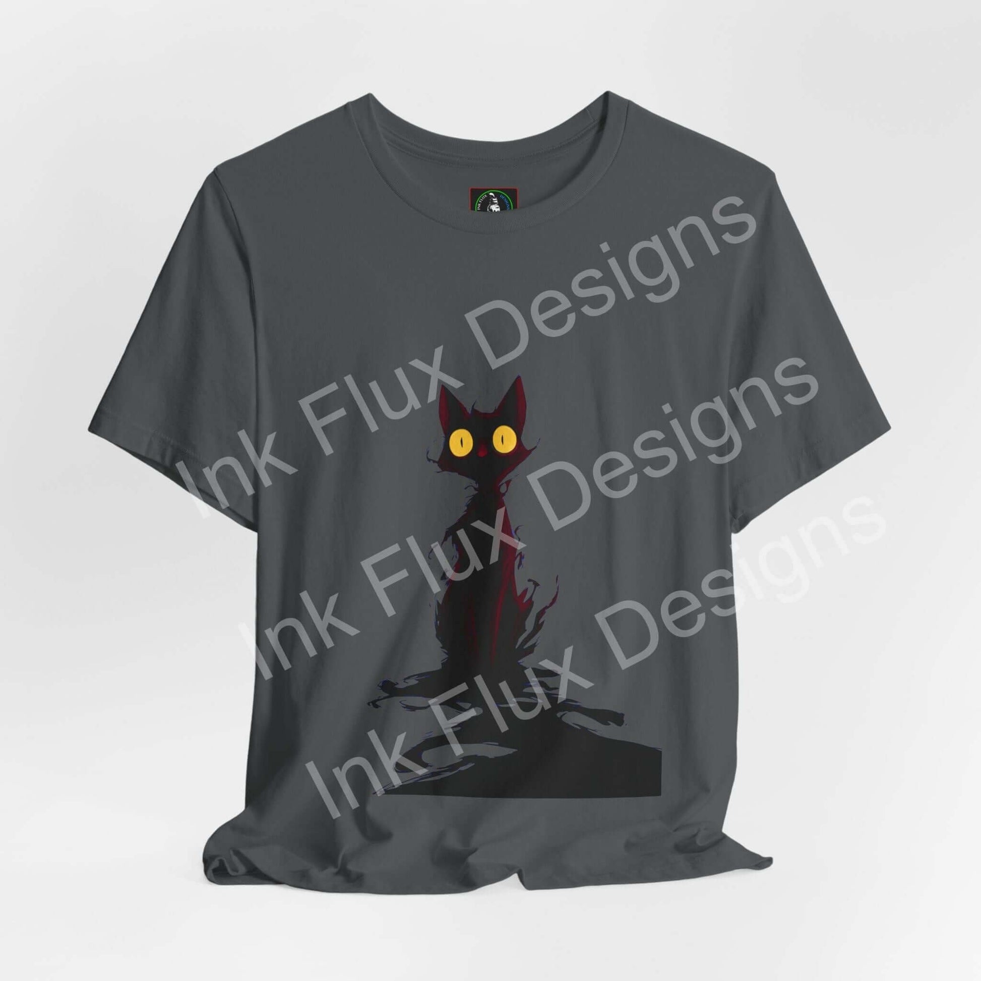 Black Cat T-Shirt featuring a shadowy black cat with glowing yellow eyes on a gray background.