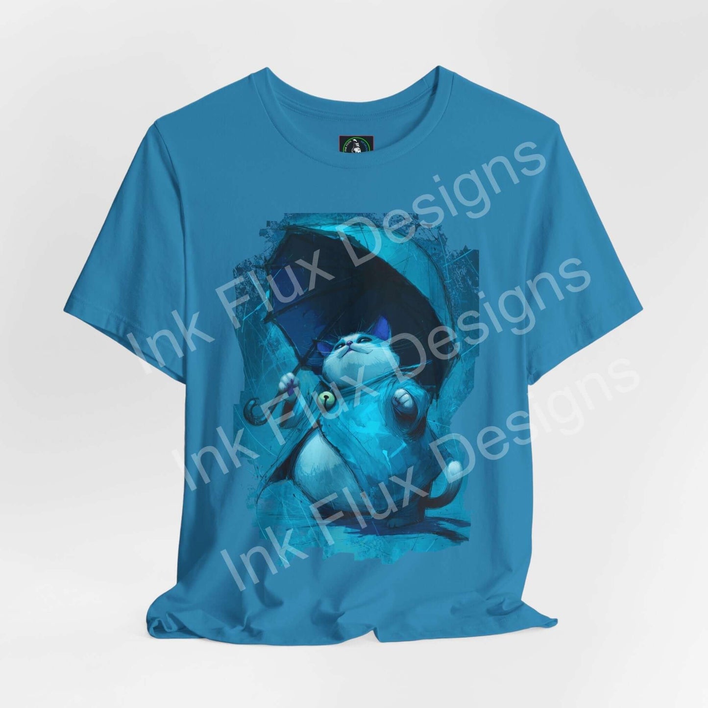 Funny Cat T-Shirt featuring a calm cat holding an umbrella in a humorous graphic design on a blue tee.
