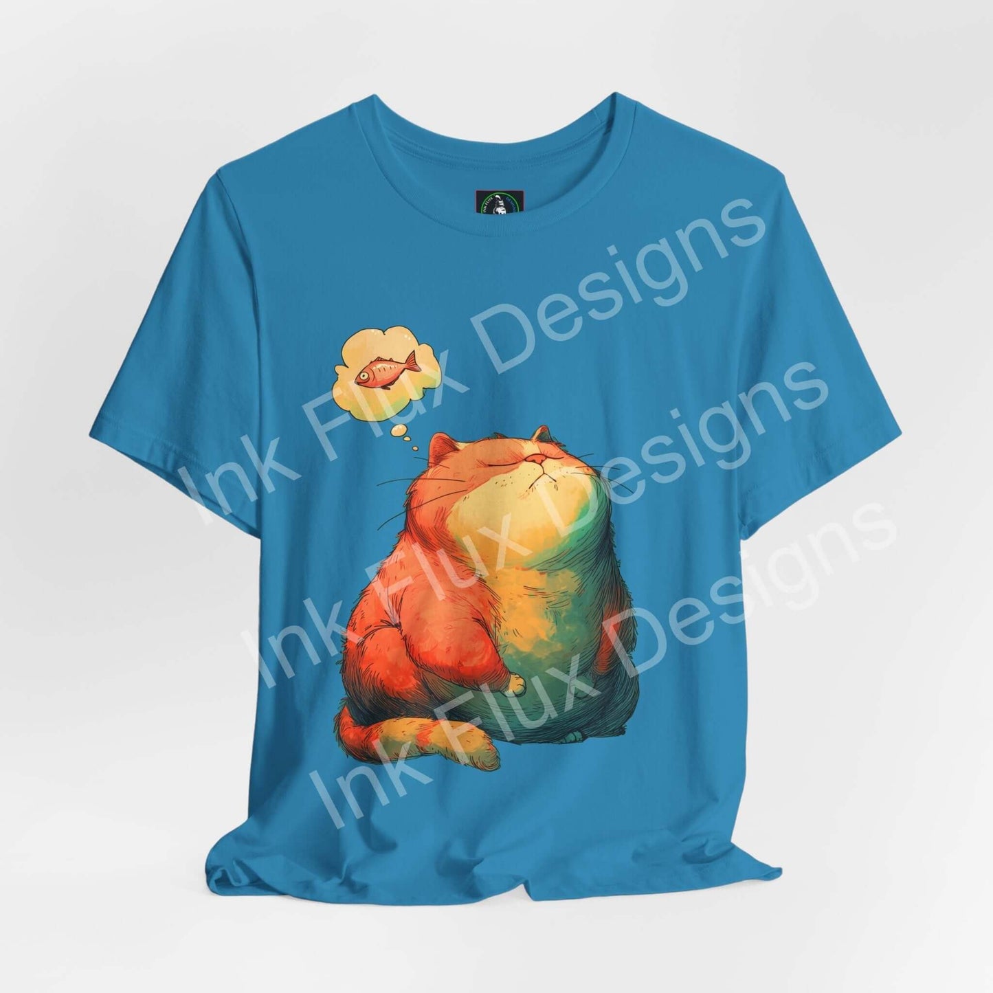 Funny Cat T-Shirt featuring a chubby orange cat dreaming of fish on a blue tee.