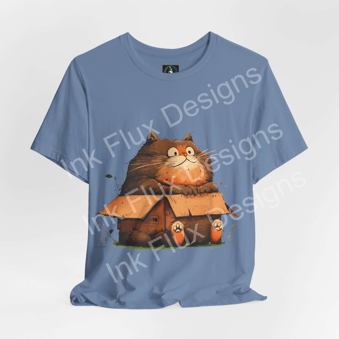 Funny Cat T-Shirt featuring a chunky cat sitting in a small box, showcasing its playful design and charm.