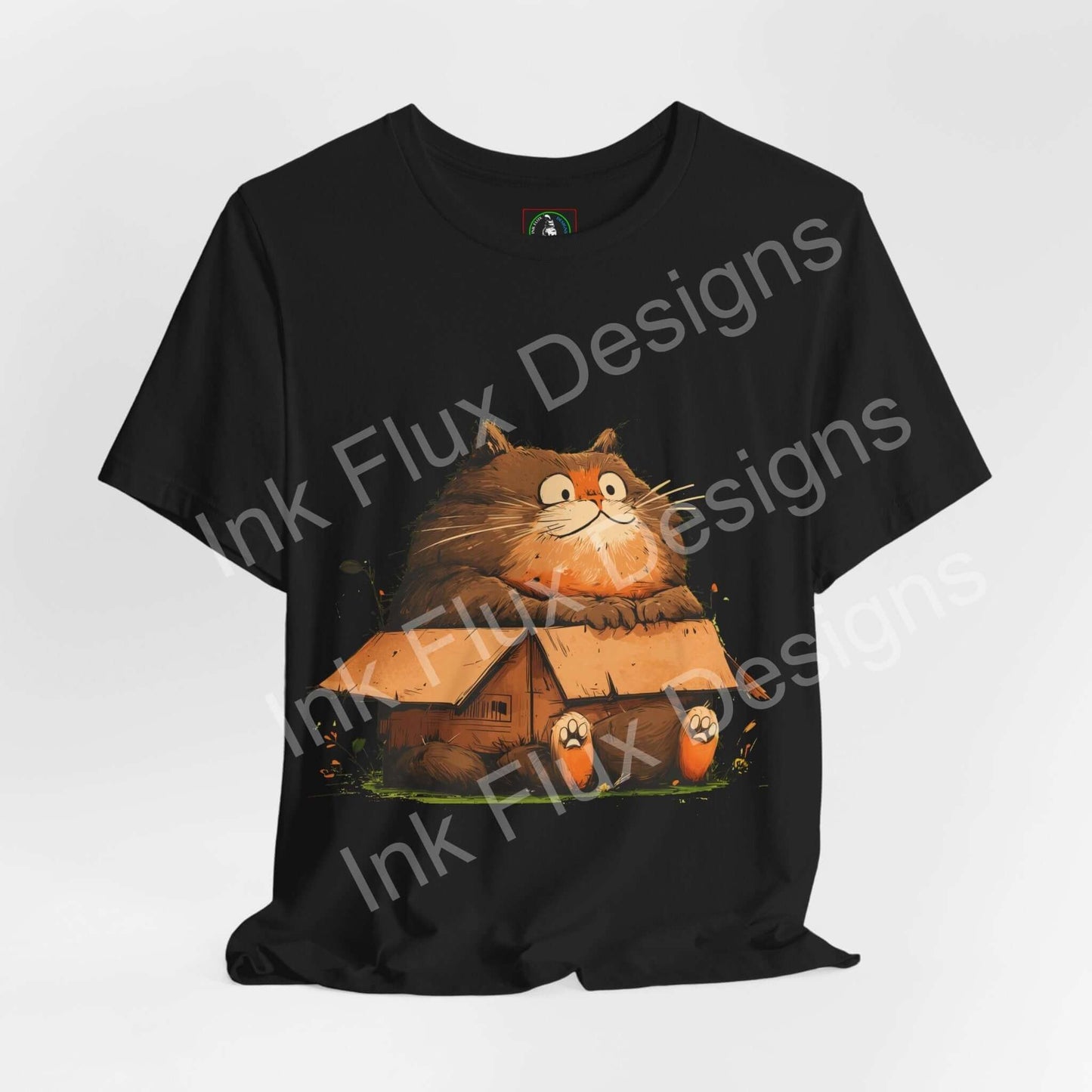 Funny Cat T-Shirt featuring a chunky cat sitting in a small box, capturing cat humor in a playful graphic design.
