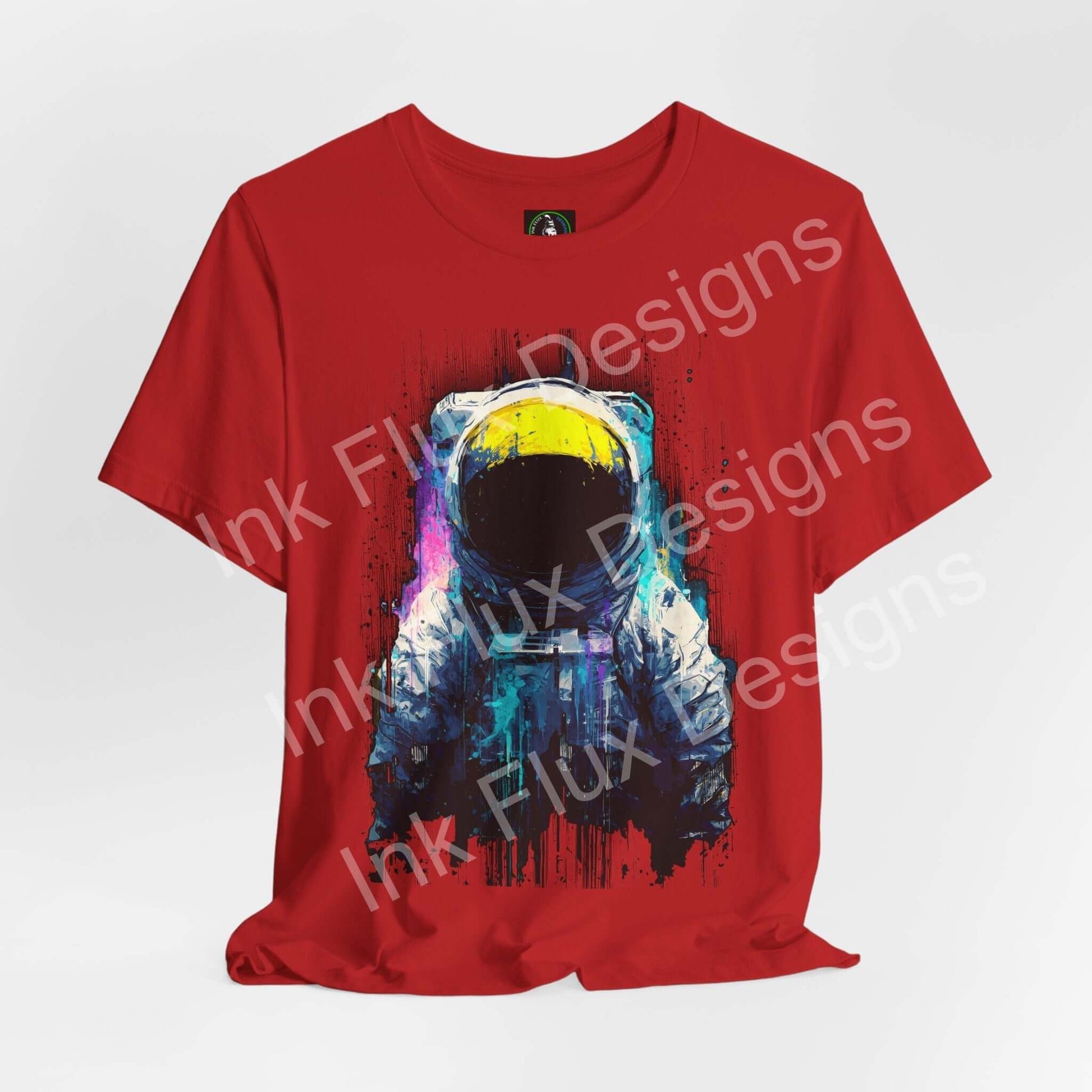 Graphic T-Shirt featuring a surreal astronaut design on a red background, showcasing vibrant cosmic elements.