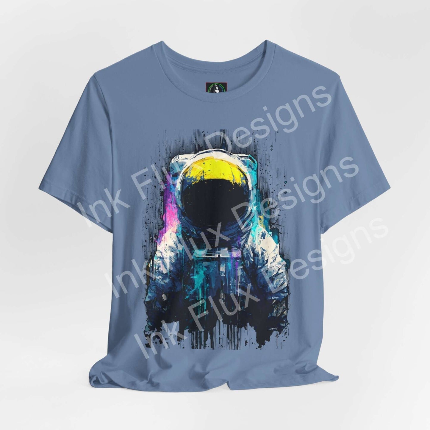Graphic T-Shirt featuring a surreal astronaut design with cosmic colors and textures.