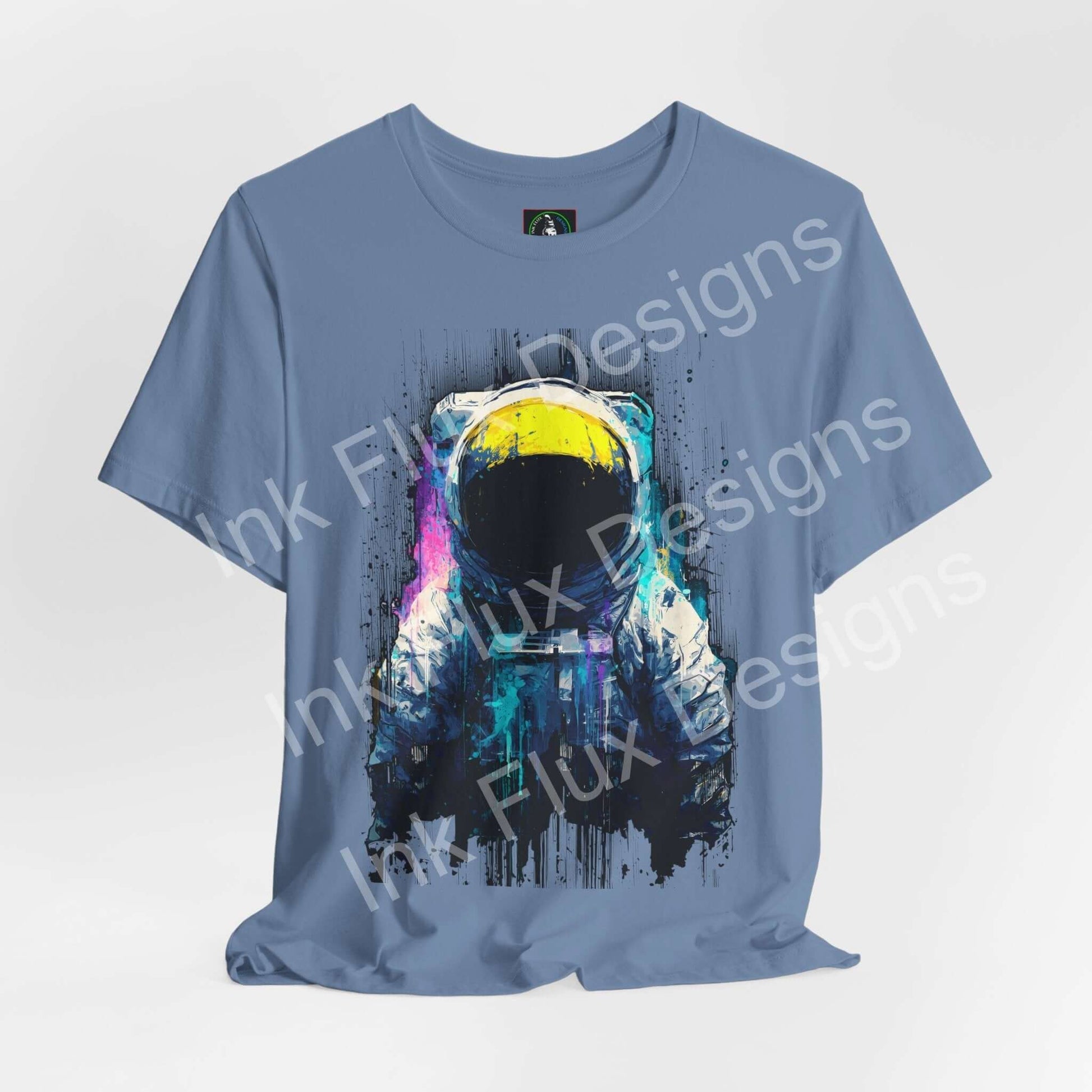 Graphic T-Shirt featuring a surreal astronaut design with cosmic colors and textures.