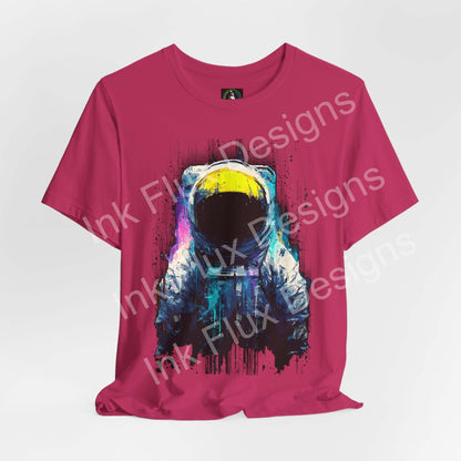 Graphic T-Shirt featuring a surreal astronaut design on a vibrant pink background, showcasing cosmic art.