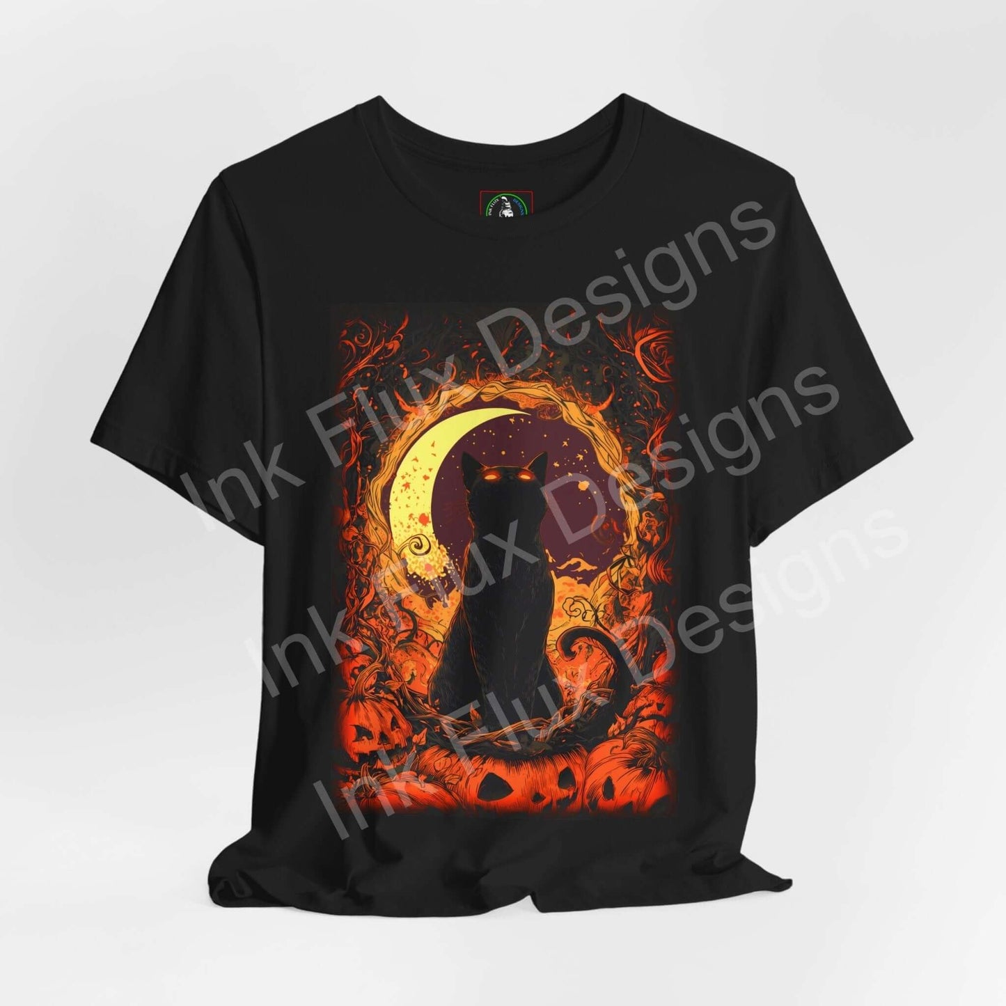 Black cat t-shirt featuring an artistic design with a mystical feline and a Halloween background by Ink Flux Designs.