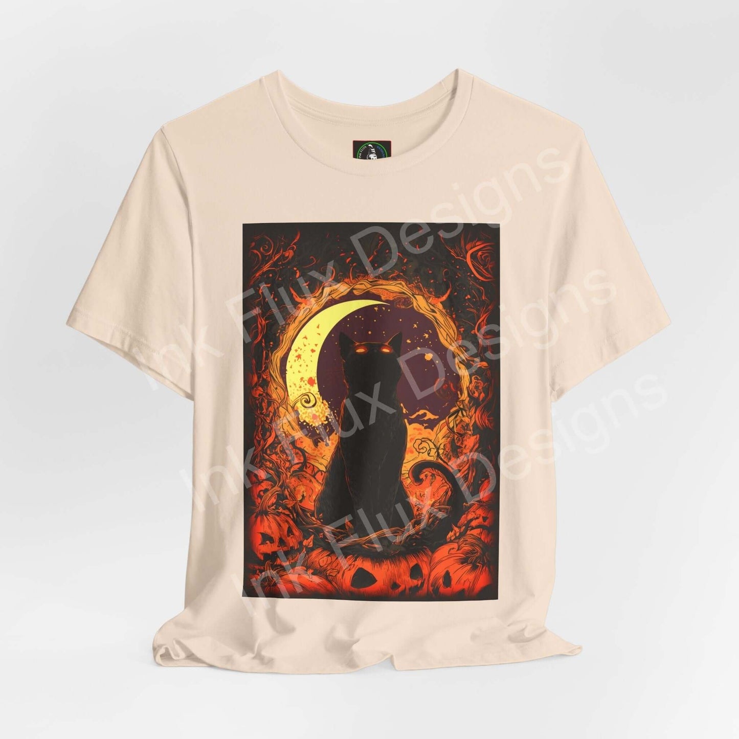 Black cat t-shirt featuring an artistic feline design with a moon and Halloween-themed background by Ink Flux Designs.