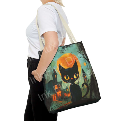 Halloween Tote Bag featuring a black cat design in a spooky nighttime setting.