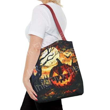 Halloween Tote Bag featuring a colorful jack-o-lantern design in an autumn scene.