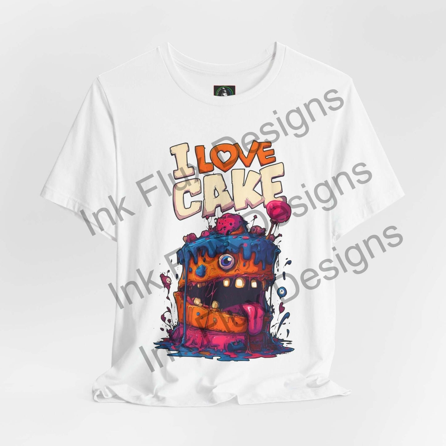 I Love Cake II Funny Graphic T-Shirt featuring a colorful monster cake design with bold cartoon artwork.
