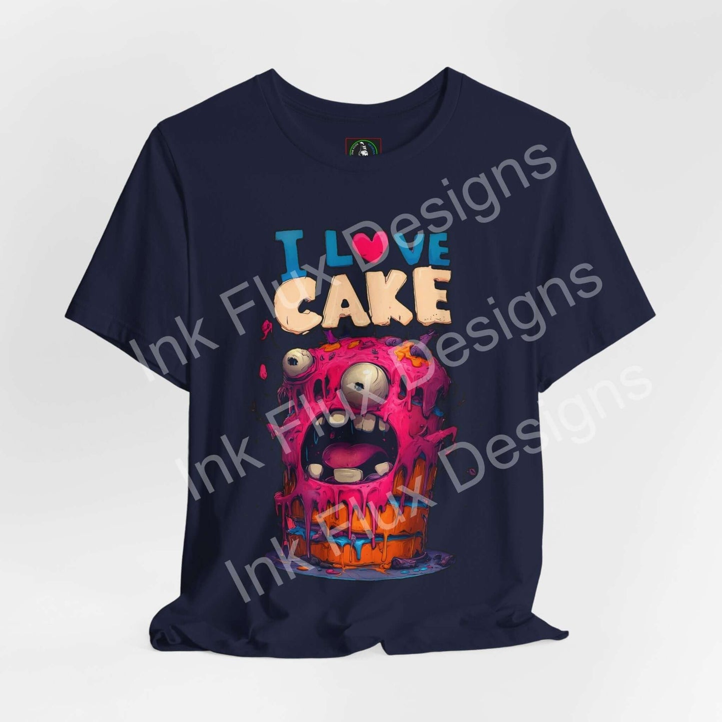 I Love Cake Funny Graphic T-Shirt featuring a colorful monster cake design with melting frosting.