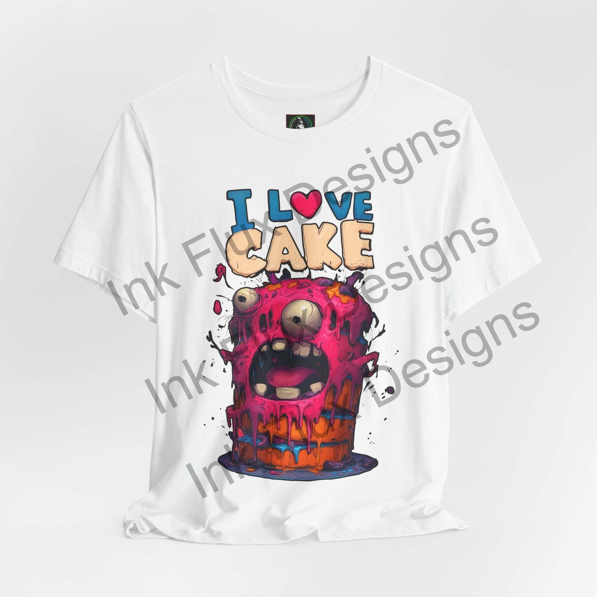 I Love Cake Funny Graphic T-Shirt featuring a colorful monster cake with melting frosting and playful design.