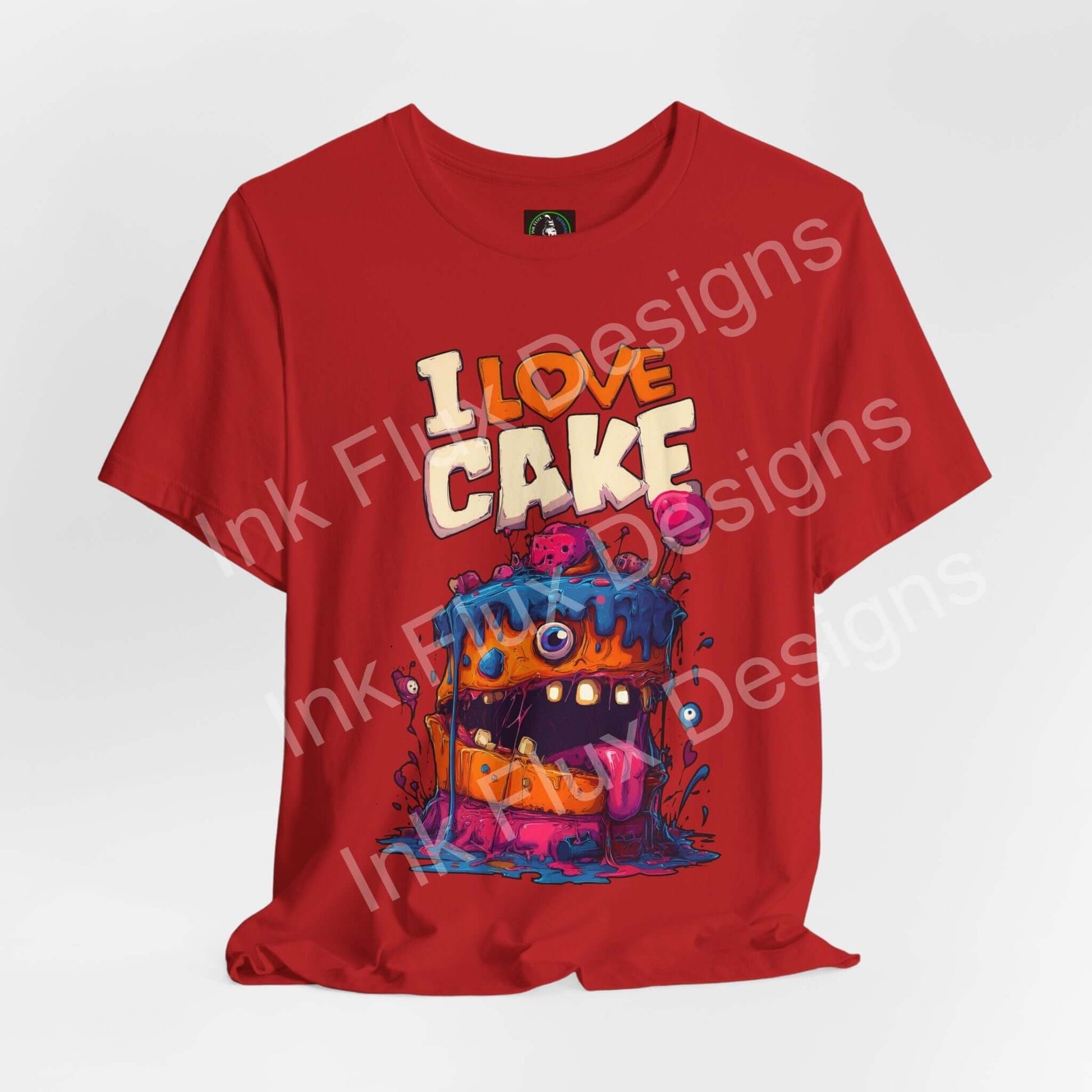 I Love Cake II Funny Graphic T-Shirt featuring a colorful monster cake design with bold cartoon art.