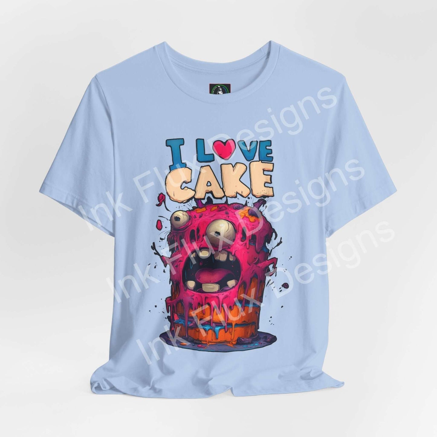 I Love Cake Funny Graphic T-Shirt featuring a colorful monster cake design with playful cartoon style.