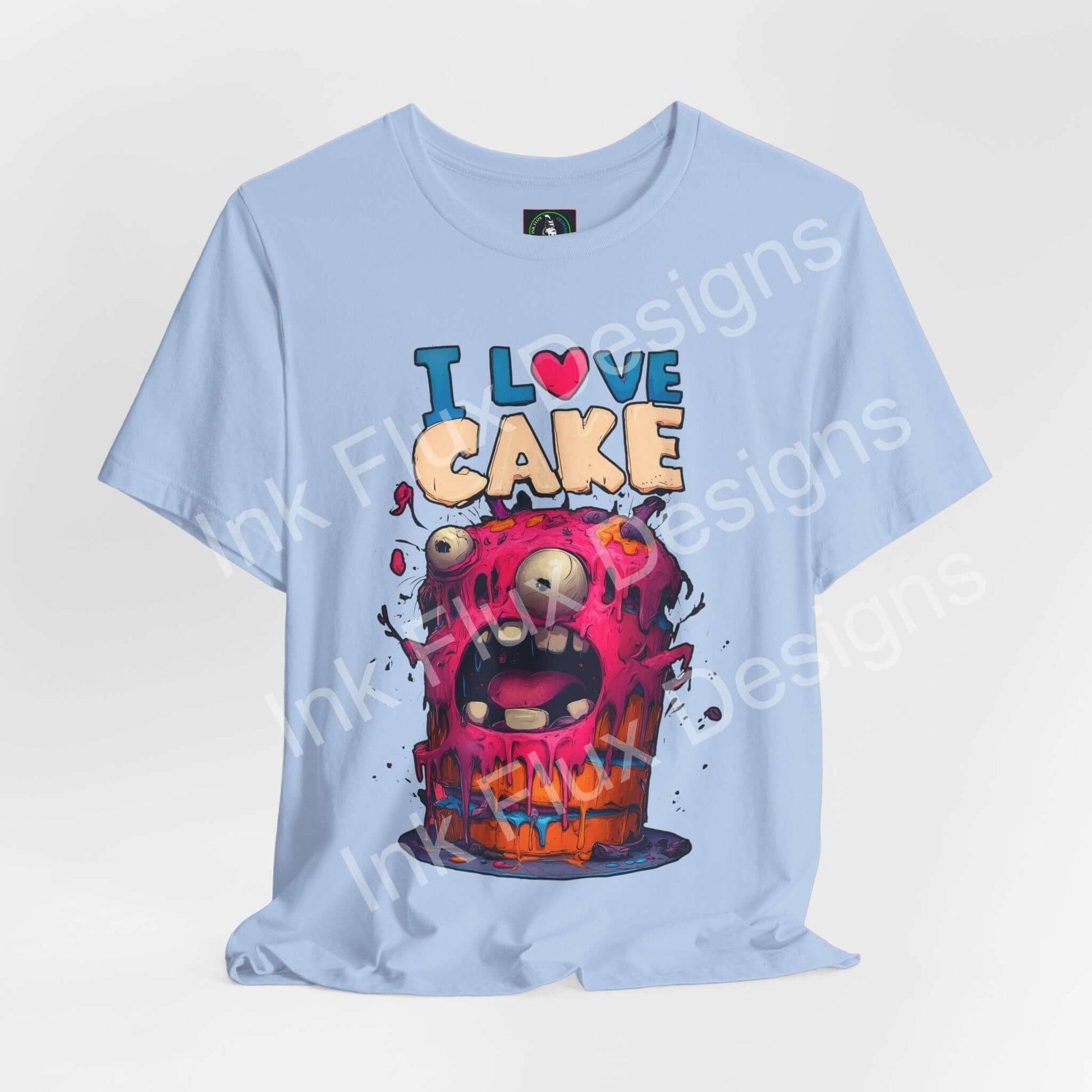 I Love Cake Funny Graphic T-Shirt featuring a colorful monster cake design with playful cartoon style.