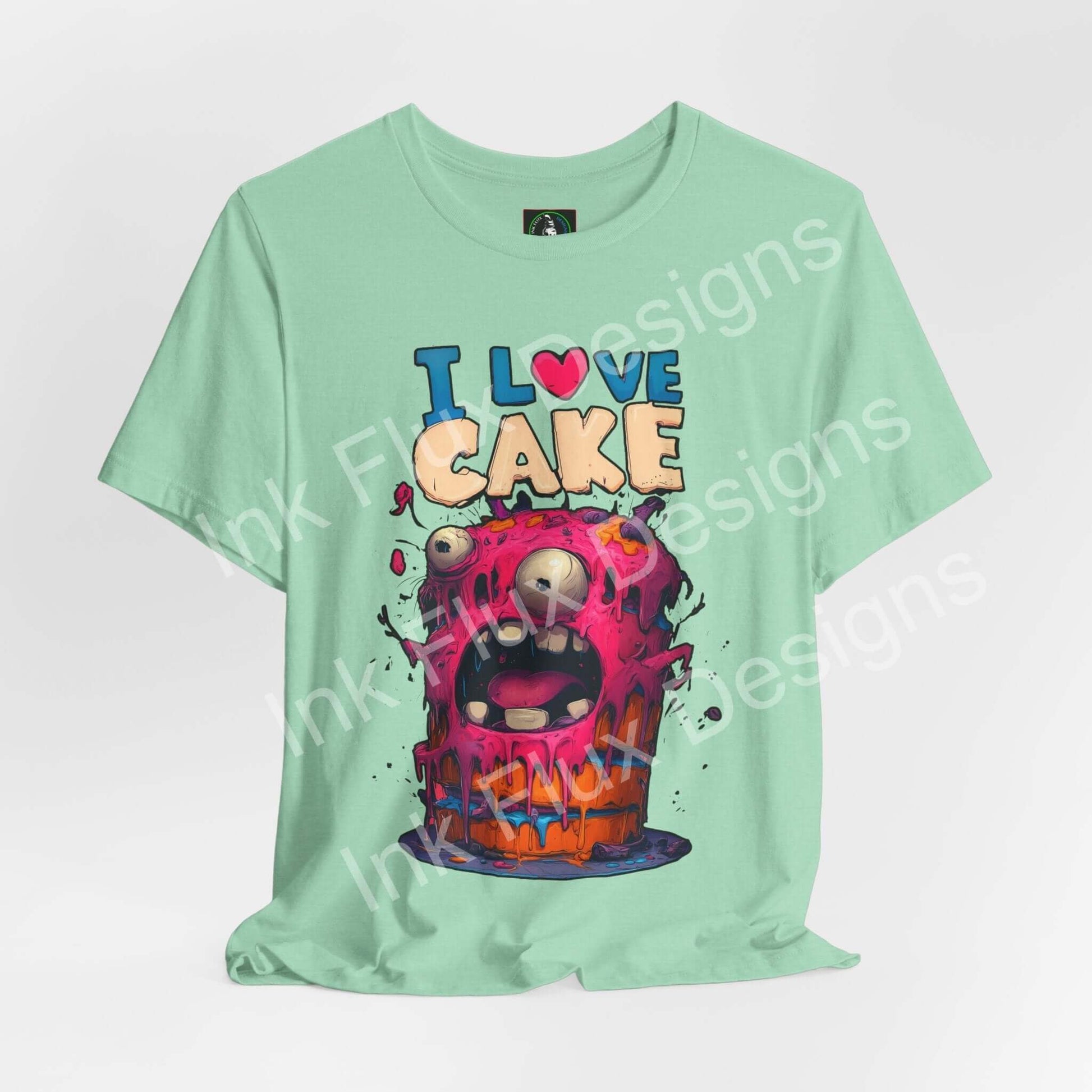 Funny Graphic T-Shirt featuring a colorful monster cake with vibrant frosting and playful design.