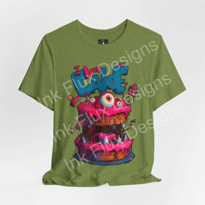 Funny Graphic T-Shirt featuring a monster cake character with oversized eyes and dripping pink icing.