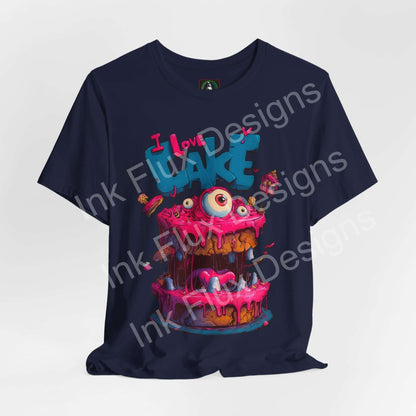 Funny Graphic T-Shirt featuring a colorful monster cake design with oversized eyes and dripping icing.