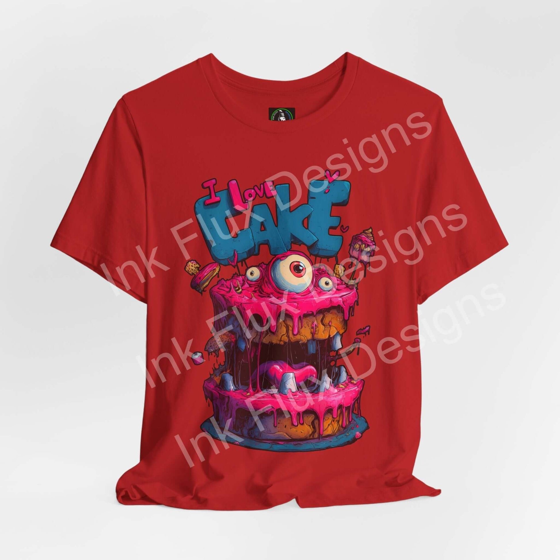 I Love Cake III Funny Graphic T-Shirt with monster cake design featuring pink icing and oversized eyes.