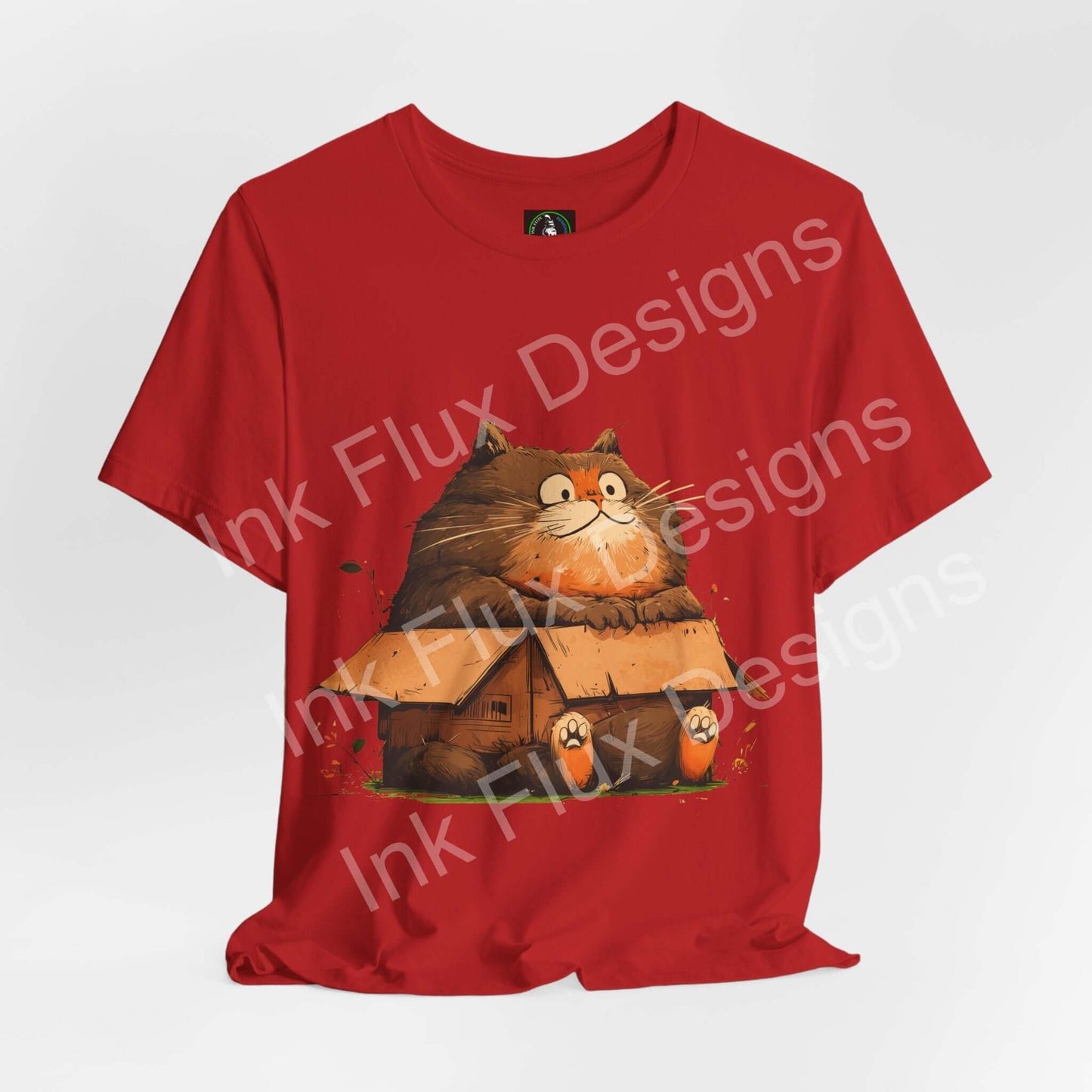 Funny Cat T-Shirt featuring a chubby cat sitting on a house, playfully capturing feline antics in a bold design.
