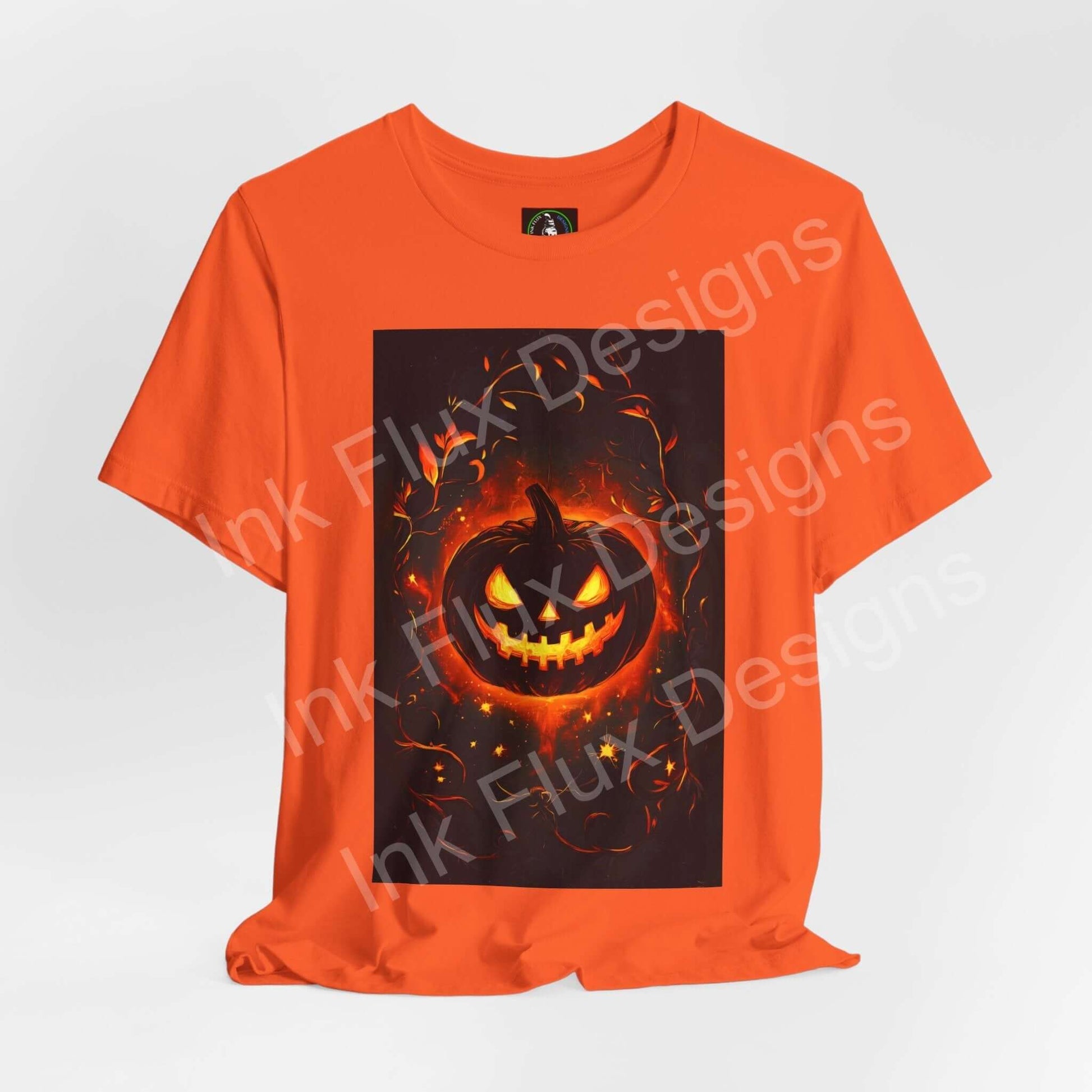 Jack-O-Lantern T-Shirt – Pumpkin Face Halloween Tee in vibrant orange with spooky pumpkin graphic.
