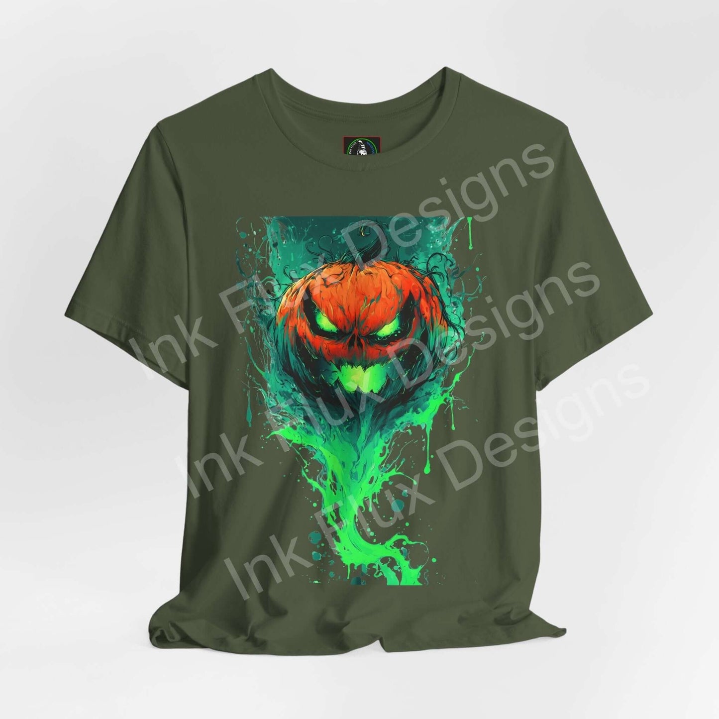Ink Flux Jack o Lantern 2025 04 unisex graphic T-shirt featuring a vibrant pumpkin design on a green background.