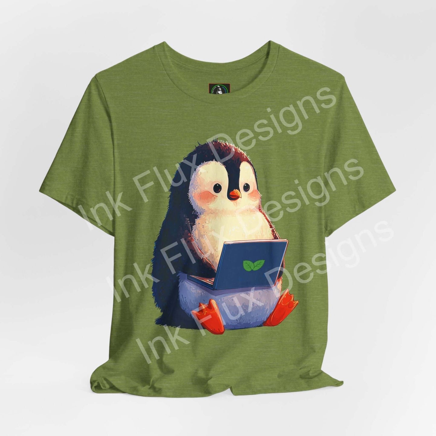 Minty Penguin Fun Graphic T-Shirt featuring an adorable penguin with a laptop design for playful creativity.