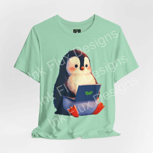 Minty Penguin Fun Graphic T-Shirt featuring a cute penguin with a laptop on a mint green background.