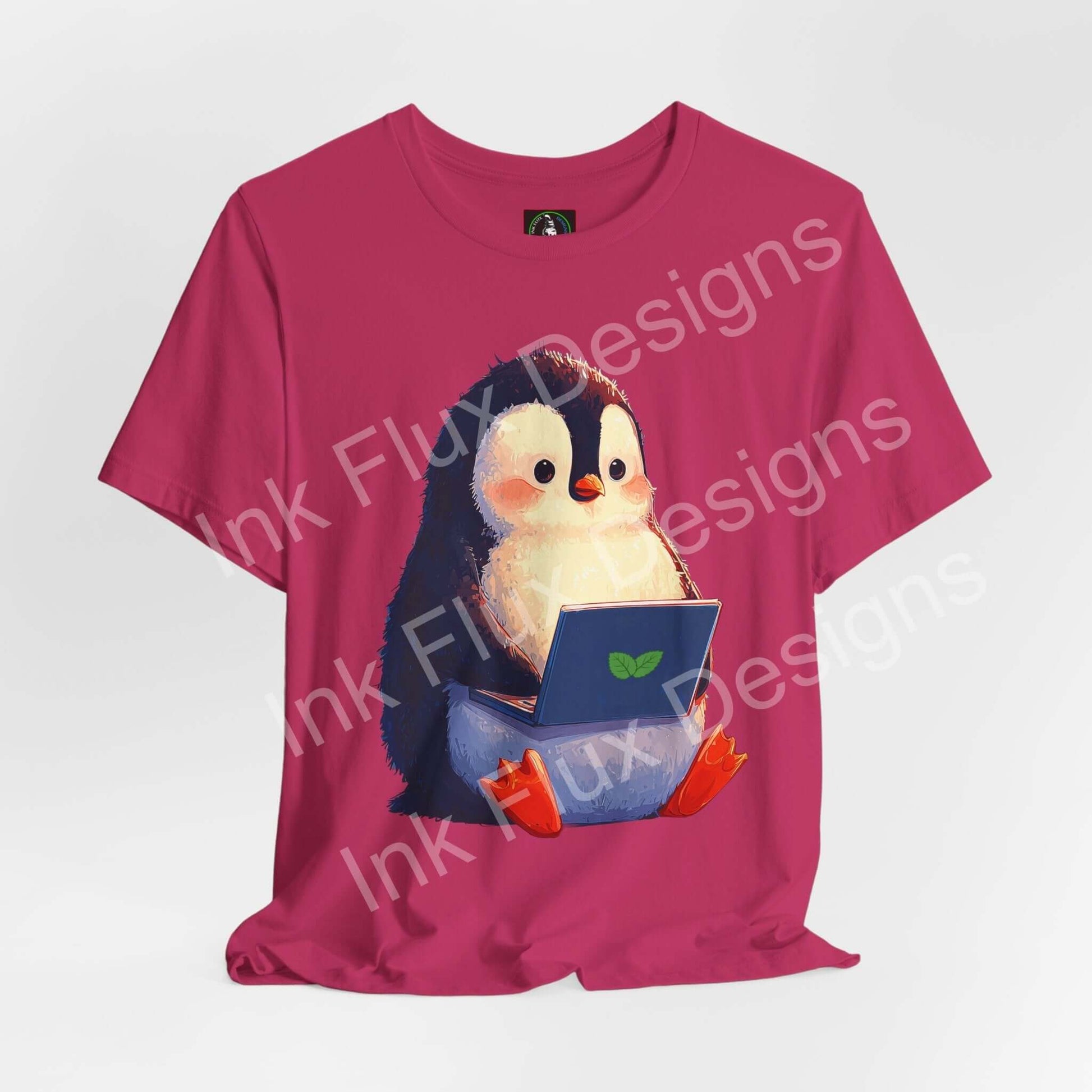 Minty Penguin Fun Graphic T-Shirt featuring an adorable penguin with a laptop design, perfect for tech lovers.