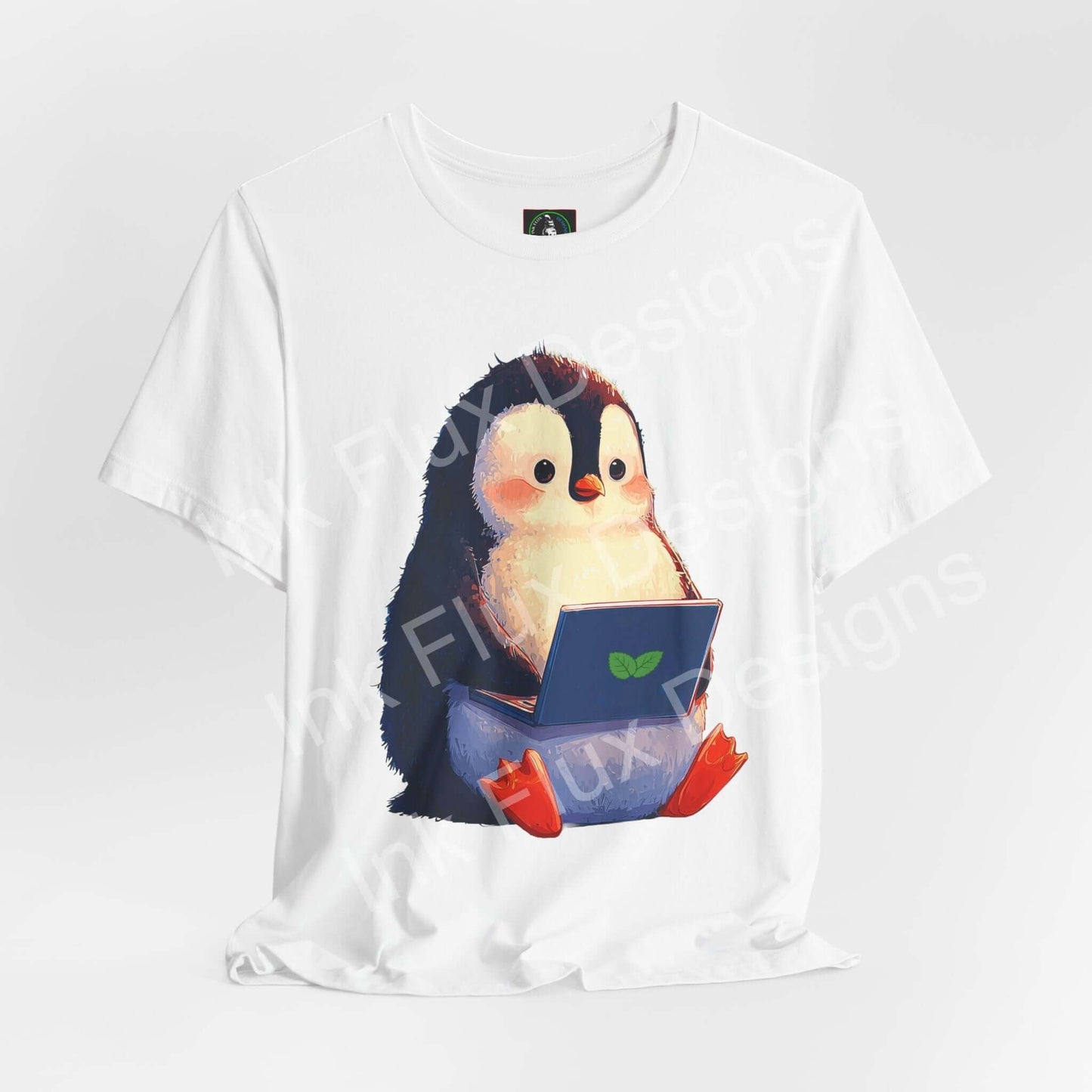 Minty Penguin Fun Graphic T-Shirt featuring an adorable penguin with a laptop design, perfect for casual wear.