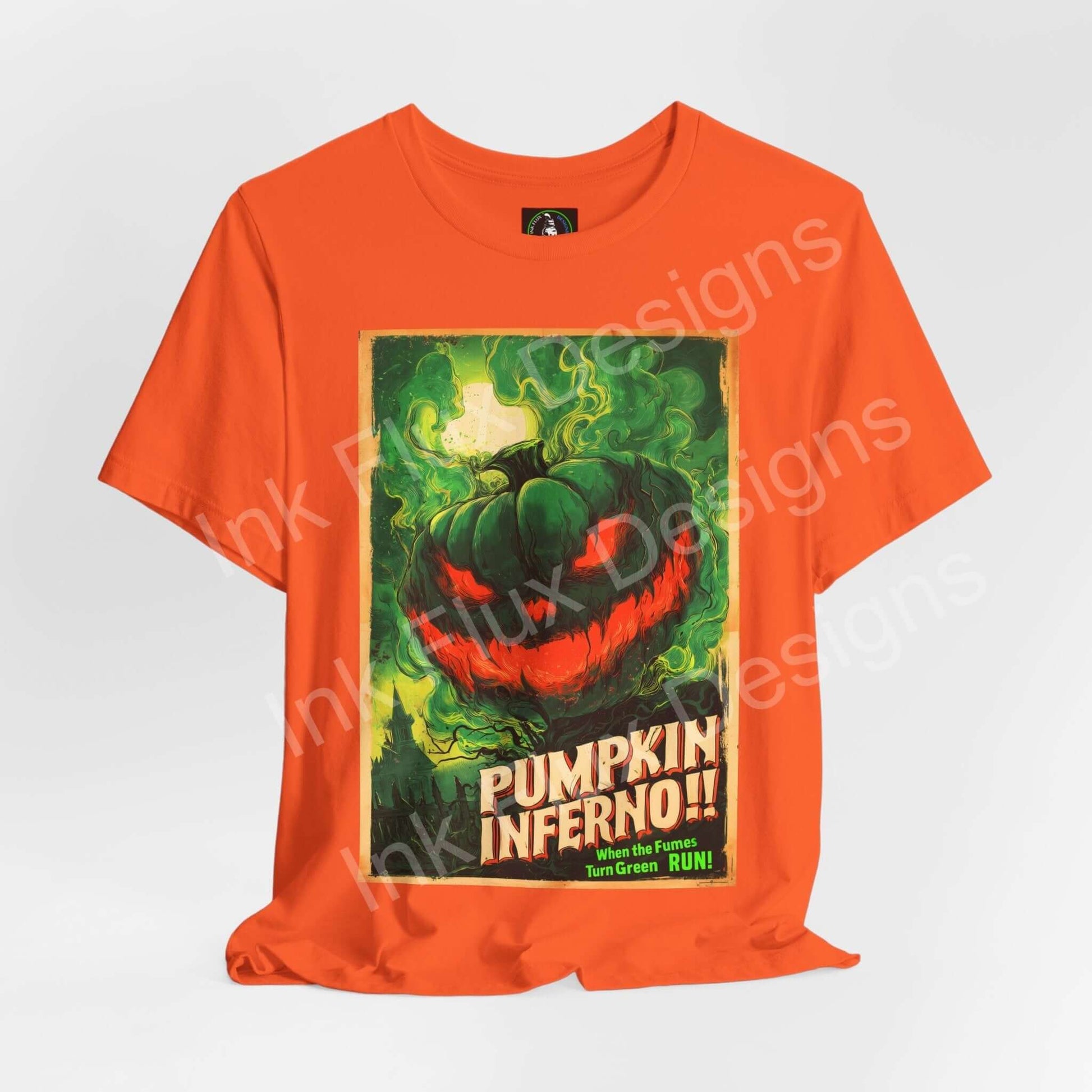 Unisex Pumpkin Inferno graphic T-shirt in orange, featuring a vibrant pumpkin design with spooky elements.