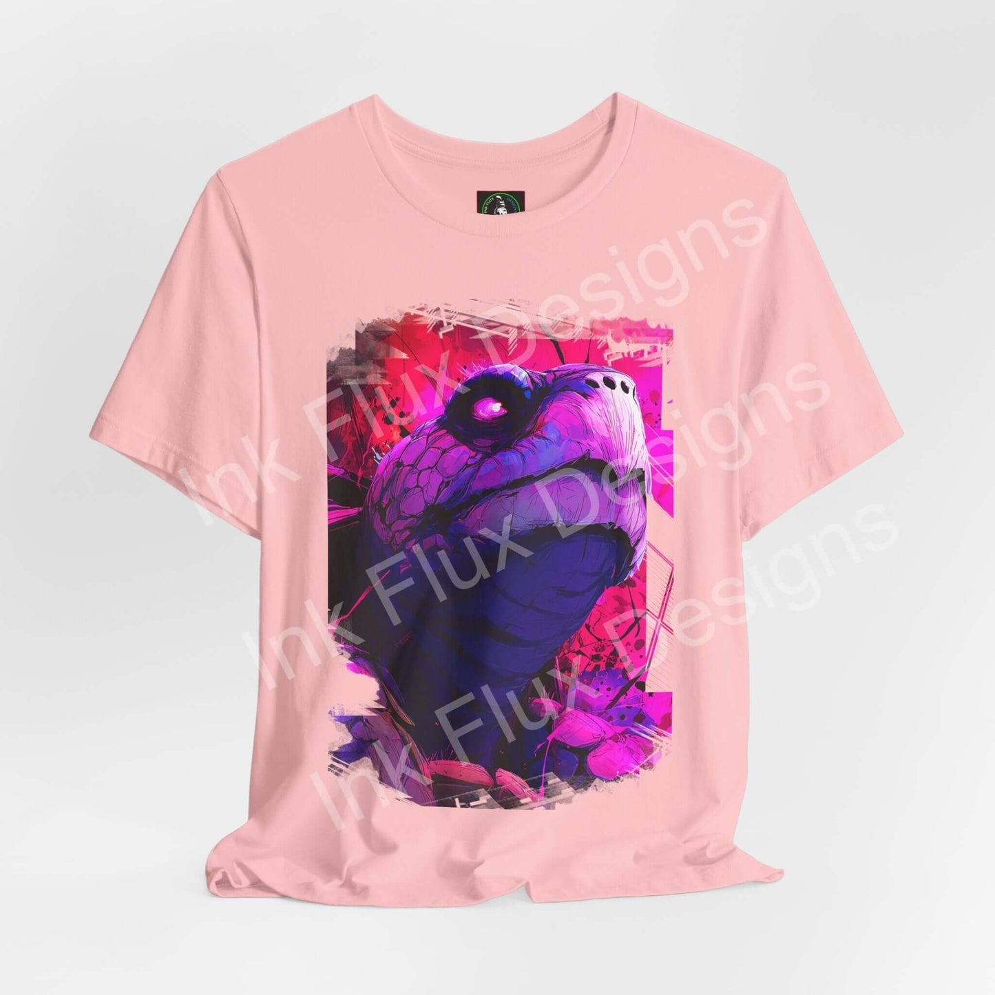 Spirit Animal T-Shirt featuring a vibrant turtle graphic design on a pink tee, symbolizing wisdom and protection.