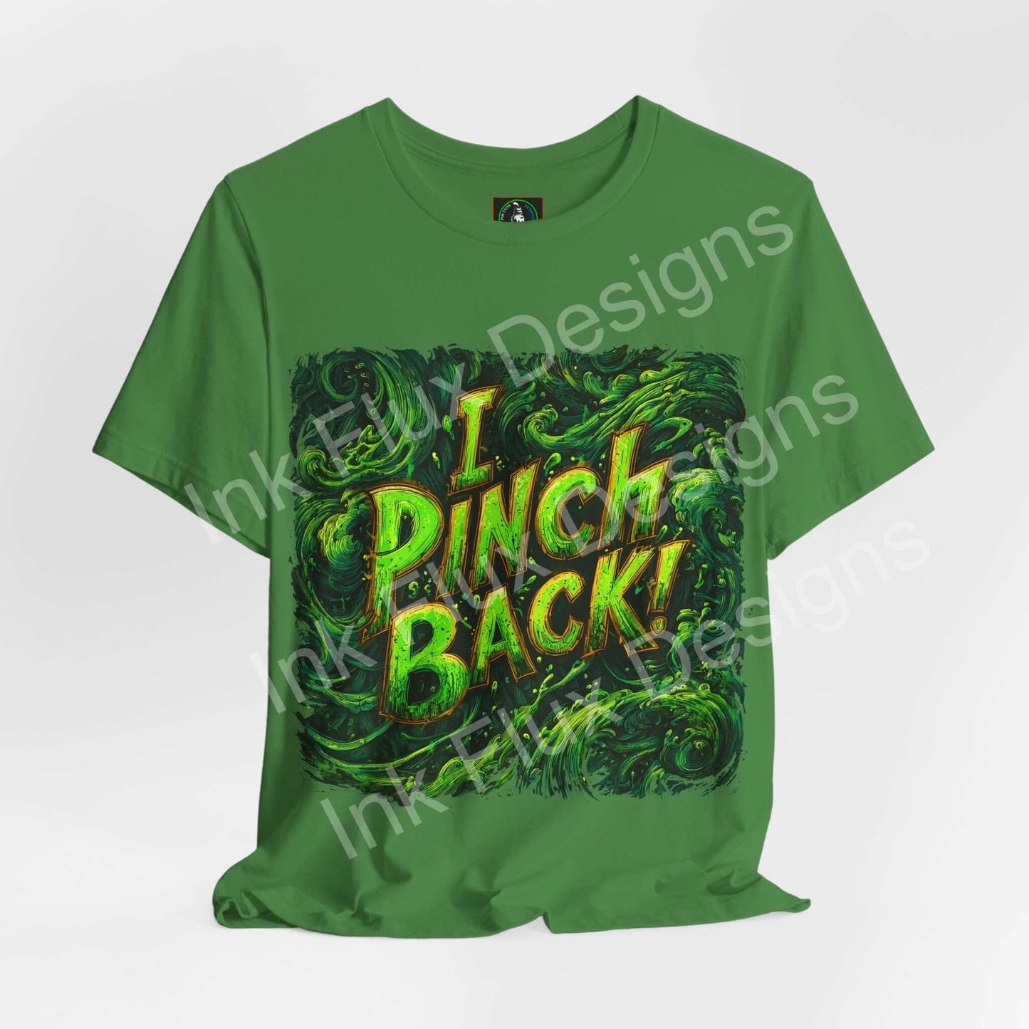 I Pinch Back! St. Patrick's Day T-Shirt with shamrock graphic design on green fabric.