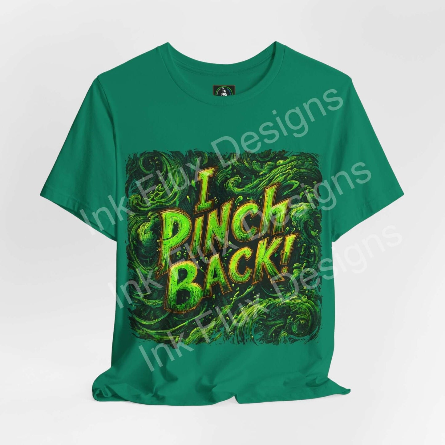 I Pinch Back! St. Patrick's Day T-Shirt with shamrock design on green fabric.
