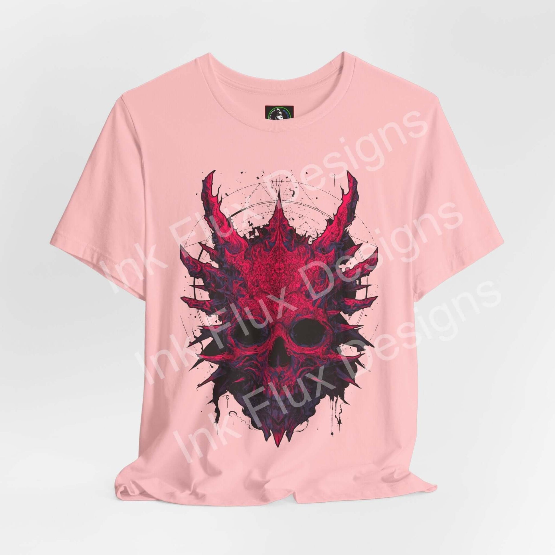 Skull Graphic T-Shirt featuring dark creature design with spikes and aggressive skull artwork in pink.